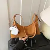 Bolso tipo bandolera popular este año, bolsa tipo dumpling para mujer, nuevo para el invierno 2025, ropa casual versátil para el trabajo, bolso retro de un solo hombro cruzado