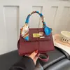 Nuevo bolso trapezoidal transfronterizo, bolso Kelly de moda mejorado, bolso simple de hombro y cruzado, bolso para mujer de diseño de nicho