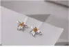 Pendientes de osmanthus fragantes de plata de ley S925 para mujer, nuevos pendientes de plata de estilo chino, pequeños y frescos, pendientes de estilo pastoral al por mayor.