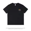 Moda Marca Hombres Verano Tops Camisetas Pequeño Estampado Manga Corta Mujeres Holgado Casual Versátil Cuello Redondo Tops Ins