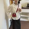 Bolsa Pequena Texturizada Retro de Luxo para Mulheres 2026 Nova Moda Nicho Versátil Bolsa de Mão Elegante Bolsa de Ombro Transversal
