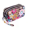 Venta al por mayor de fábrica nueva cartera monedero bolso femenino coreano estampado cartera bolso para teléfono móvil cartera de dama bolso de tela para correr