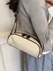Bolsa de Bolos de Mano para Mujer 2026 Nuevo Otoño Invierno Súper Caliente Color Sólido Tacto de Alta Gama Hombro Único Bolso Baguette para Viaje
