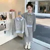Conjunto de Ropa de Primavera para Niñas: Conjunto de Dos Piezas Sudadera Estilo Coreano de Manga Larga Falso Dos Piezas y Falda Versátil