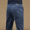 Pantalones casuales de alta gama para hombre nuevos de Hong Kong, para primavera y otoño, holgados, de pierna recta, de negocios, antiarrugas, tipo traje