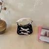 Bolsa de ombro de alta qualidade transfronteiriça, nova bolsa de mão estampada com poá e renda primavera-verão, bolsa transversal com laço de princesa