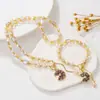 25 Nuevo Colgante de Margarita de Circonita de Colores Otoño e Invierno Hebilla Ot de Perla de Agua Dulce Pulsera de Cristal Collar Dulce Lujo Accesible Sentido de Alta Gama