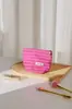 Bolsa de maquillaje simple a rayas bicolor, portátil y artística, adecuada para viajes, almacenamiento de productos para el cuidado de la piel, bolso de mano, bolsa tipo almohada