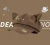 Fábrica de Sombrero Octagonal con Orejas de Gato de Algodón Beret de Dibujos Animados Lindo al por Mayor para Mujeres Estilo Dulce Japonés Versátil que Hace que la Cara Parezca Más Pequeña