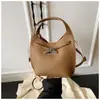 Bolsas de Mano Simples y Versátiles de Otoño e Invierno Nuevas Transfronterizas Bolso Tote Pequeño Nuevo 2025 Bolso Cubo de Gran Capacidad Bolso de Viaje