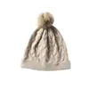 Cachemira Otoño/Invierno 2026 Nuevo Sombrero de Punto Versátil para Mujer con Pompón, Protección para los Oídos, Tejido de Cable, para Maternidad y Posparto, Sombrero Cálido de Punto