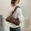 Bolso de nicho para el día a día de gran capacidad con lazo plisado, bolso nube de un solo hombro para mujer, nuevo bolso de moda 2026 para el antebrazo