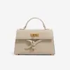 Bolso pequeño cuadrado de diseño exclusivo con estampado de lichi para mujer, nuevo bolso tipo corbatín 2026, moderno bolso mini de hombro y cruzado