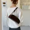 Bolso de ante retro estilo coreano para debajo del brazo, nuevo modelo 2026, bolso baguette versátil para el día a día, bolso tipo almohada de diseño nicho
