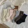 Calcetines de Dibujo de Bola de Peluche de Media Pantorrilla con Accesorios de Moño Calcetines Lindos Estilo Amoroso Universitario Aliento de Bebé