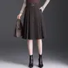Moda y versátil falda de lana línea A para mujer, otoño 2026 nueva de cintura alta adelgazante elegante que reduce la edad falda de cuadros para mujer