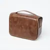 2025 Nova Bolsa de Higiene Pessoal Masculina em Couro PU Mais Vendida Portátil de Viagem Bolsa de Armazenamento para Artigos de Barbear