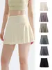 Falda corta deportiva para mujer 2026 verano dos piezas anti-exposición falda de yoga para correr y fitness talla grande bádminton falda plisada