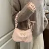2026 Primavera Temprana Nuevo Estilo Lazo Moderno Debajo del Brazo Dulce y Fresco de Moda Bolso de Hombro para el Trabajo y los Viajes