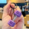 Serie Creativa de Deportes y Fitness Llavero de Mancuerna con Barra de Metal Pequeño Regalo de Entrenamiento Deportivo para Niños y Niñas Colgante para Mochila
