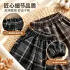 Pantalones de forro polar para niños de comercio exterior 2026 otoño e invierno nuevo estilo pantalones casuales para niños holgados y elegantes pantalones jogger de cuadros coreanos