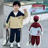 Conjunto de Traje de Esquí para Niños 2026 Nuevo Estilo Otoño Moda para Niños Pequeños y Medianos Ropa Infantil de Comercio Exterior Ropa Deportiva para Niños Conjunto de Dos Piezas