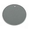 Tapete isolante de silicone em formato de colmeia, venda internacional imperdível. Tapete de silicone redondo anti-escaldante para panelas, tigelas e mesas. Venda por atacado direto da fábrica.