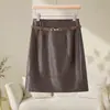 Saia de couro marrom, novo estilo outono 2026 feminino, saia midi reta em A de cintura alta em PU para trabalho, emagrecedora