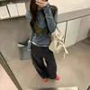 Camiseta de otoño de estilo coreano de dos piezas retorcida para mujer, corte ajustado, adelgazante, top con diseño de bloques de color en capas de nicho