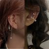 Clip de oreja de alta gama ins a la moda todo partido con borla de perlas diseño de nicho femenino personalidad clip de hueso de oreja sin perforación de lujo ligero femenino