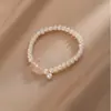 Pulsera de Flor de Perla de Agua Dulce Oval Irregular para Mujer, Estilo de Lujo Ligero de Nicho, Joyería de Moda con Cuentas de Flor de Cristal Rosa