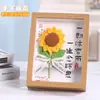 26 artículos nuevos para regalo del Día del Maestro: Adornos de marco de fotos de girasol tejidos, marcos de fotos de recuerdo terminados