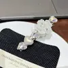 Pinza para el cabello de alta gama con forma de corazón de perla, pinza de pico de pato para flequillo lateral, pinza lateral de figura de ocho con pedrería para mujer