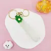 Llavero Colgante de Cordón de Cuero con Letra Transparente Brillante con Accesorios Estilo Muñeca Rellena de Aceite Encanto de Llavero Pulsera Venta al por Mayor