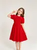 Moda Verano Niñas Cuello Redondo Manga Corta Color Sólido Lazo Perlas Elegante Vestido de Fiesta Ropa Infantil Venta al por Mayor