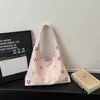 Bolso de Axila de Diseño de Nicho Transfronterizo para Mujer 2026 Nuevo Verano Retro Hueco Bolso Versátil para el Trabajo Bolso de Hombro