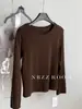Camiseta de manga larga con cuello redondo, estilo minimalista, para mujer, otoño 2026, básica, corte holgado, adelgazante, versátil, disponible en varios colores