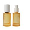 Botella de vidrio de base líquida redonda y recta de 30 ml, prensada, para emulsión, antiaislamiento, para subembotellado, materiales de envasado cosmético.