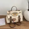 Nova Bolsa Transversal de Urso Estilosa 2026, Mochila de Design de Nicho Versátil e Fashion, Mochila Multifuncional na Moda