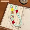 Colgante de Muñeca con Cuerda Trenzada de Colores Accesorios Decorativos Colgantes Cuerda Llavero de Mochila Gancho para Lanyard DIY Venta al por Mayor
