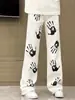Jeans Acampanados Estilo Americano para Hombre Verano 2025 Pantalones con Estampado de Palmeras Marca de Moda Streetwear Atractivo Pantalones de Calle