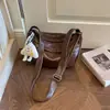 2026 Outono Inicial Nova Bolsa Casual Retrô de Grande Capacidade Feminina Cor Sólida Bolsa Bolinho Simples para o Dia a Dia Ombro Único Transversal