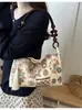 Bolsa feminina super popular de nicho estilo chinês novo modelo 2026, bolsa de ombro/axila bordada estilo nacional para o dia a dia, pequena bolsa para sair