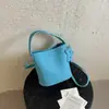 Exquisita Mini Bolso de Nicho con Patrón de Lichi para Mujer 2026 Nueva Moda Versátil Bolso Cruzado Súper Popular Bolso Cubo para Teléfono