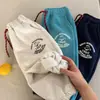 Calça Infantil 2026 Outono/Inverno Novo Estilo Meninos e Meninas Estampa de Desenho Moletom Felpudo Calça Casual Quente com Punho para Bebê