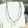 Collar de cuentas de arroz de piedra natural de alta calidad con nuevo color de nicho transfronterizo, cadena de clavícula con letras de acero de titanio y temperamento femenino, venta al por mayor