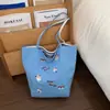 Bolso de Hombro de Gran Capacidad para el Trabajo y los Viajes Diarios para Mujer 2026 Nuevo Bolso de Tela de Nylon de Comercio Exterior con Bordado de Cachorro de Dibujos Animados Bolso de Doble Cara