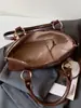 Bolsa feminina Shuai Mi Jia de cor sólida simples, nova bolsa feminina da moda, bolsa de ombro e transversal estilosa e única de nicho