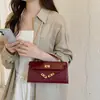 Bolso 2026 Otoño Nuevo Bolso Kelly de Gama Alta de Moda Versátil Texturizado Pequeño Cuadrado Bolso Cruzado para Mujer