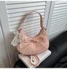 Bolso bandolera versátil de alta gama, casual de nicho, estilo dulce de lazo simple popular de este año, portátil, en forma de media luna